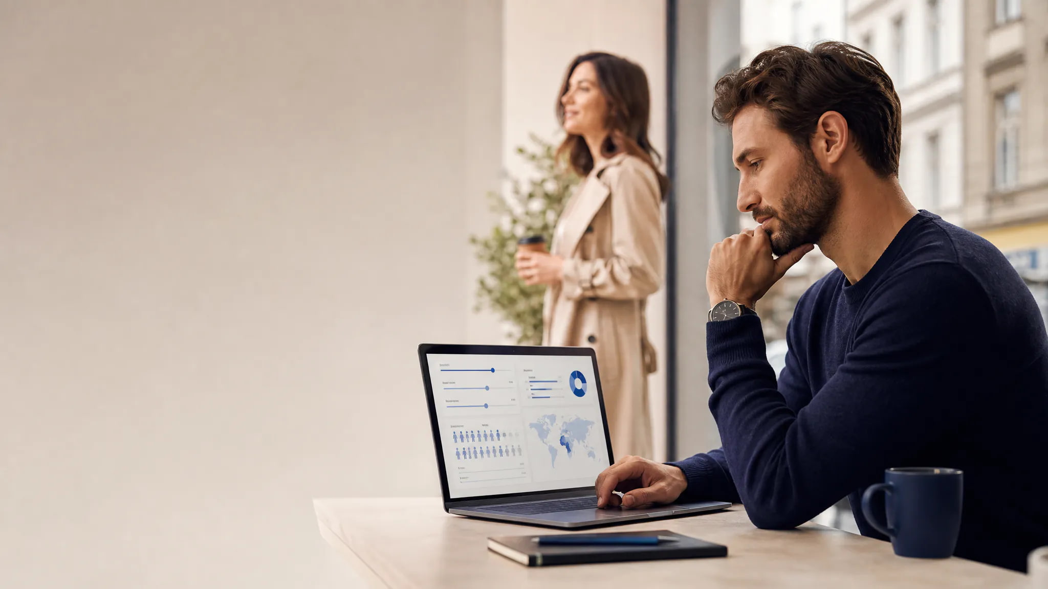 A man reviewing demographic insights on a laptop while considering his female partner preferences